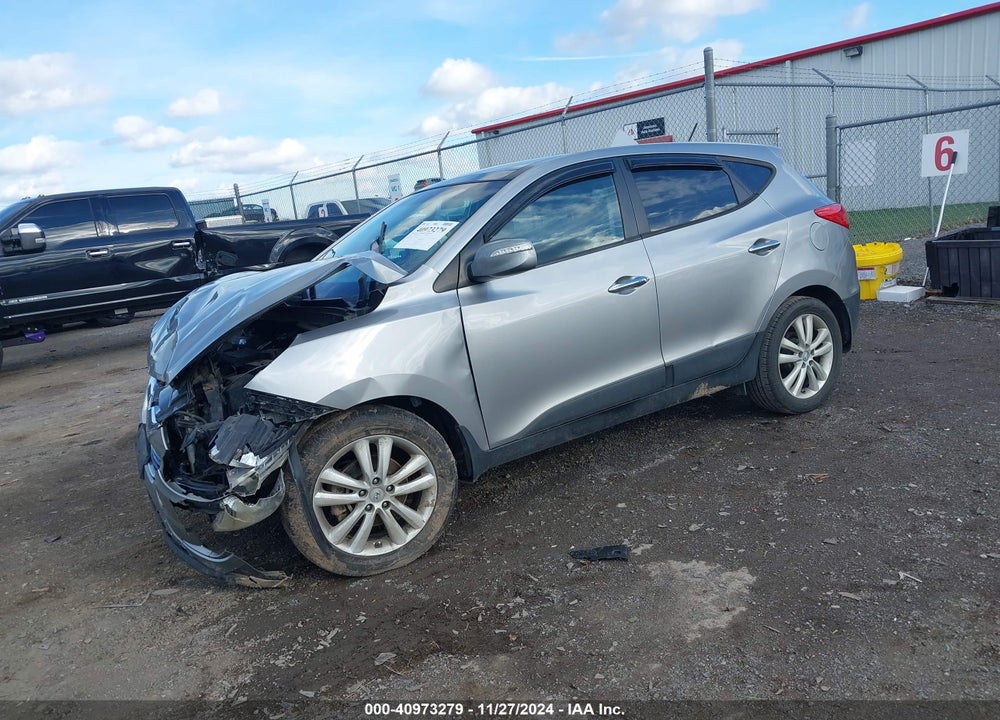 2013 HYUNDAI TUCSON LIMITED VIN: KM8JUCAC7DU623225