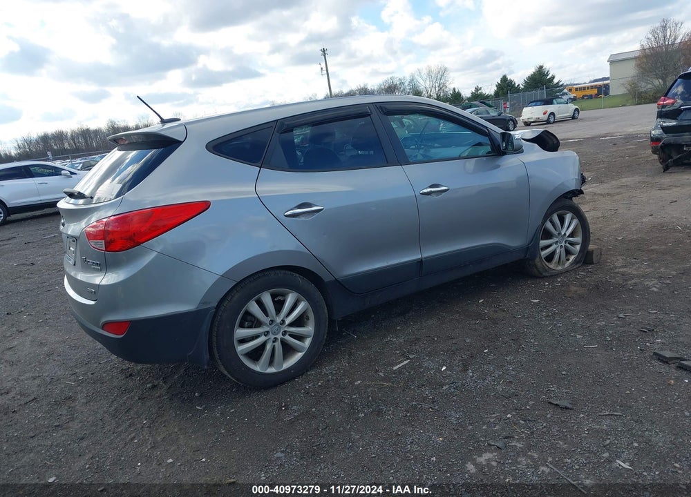 2013 HYUNDAI TUCSON LIMITED VIN: KM8JUCAC7DU623225