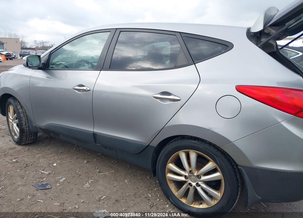 2013 HYUNDAI TUCSON LIMITED VIN: KM8JUCACXDU557981
