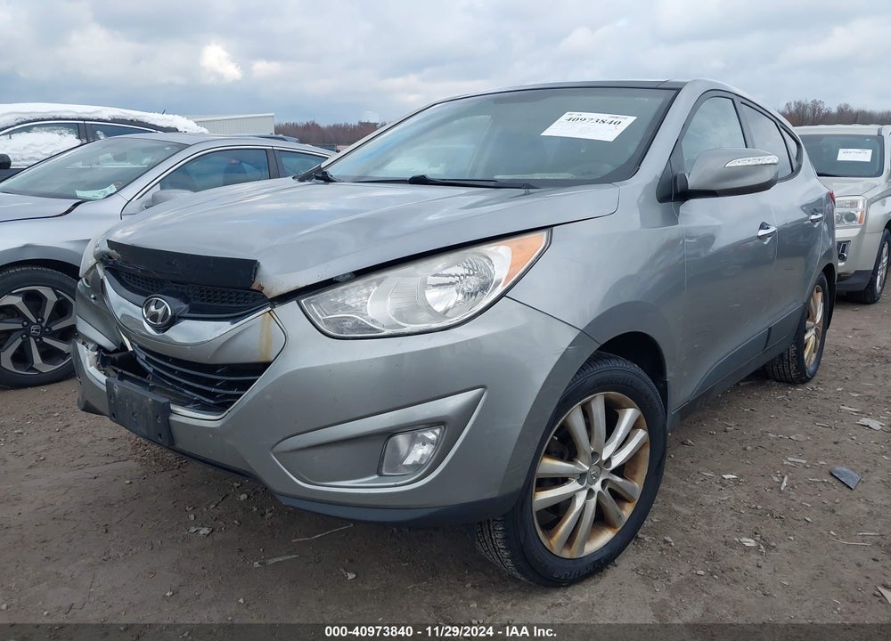 2013 HYUNDAI TUCSON LIMITED VIN: KM8JUCACXDU557981