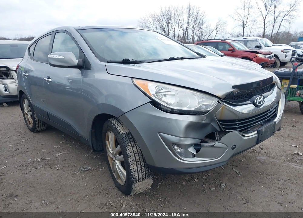 2013 HYUNDAI TUCSON LIMITED VIN: KM8JUCACXDU557981