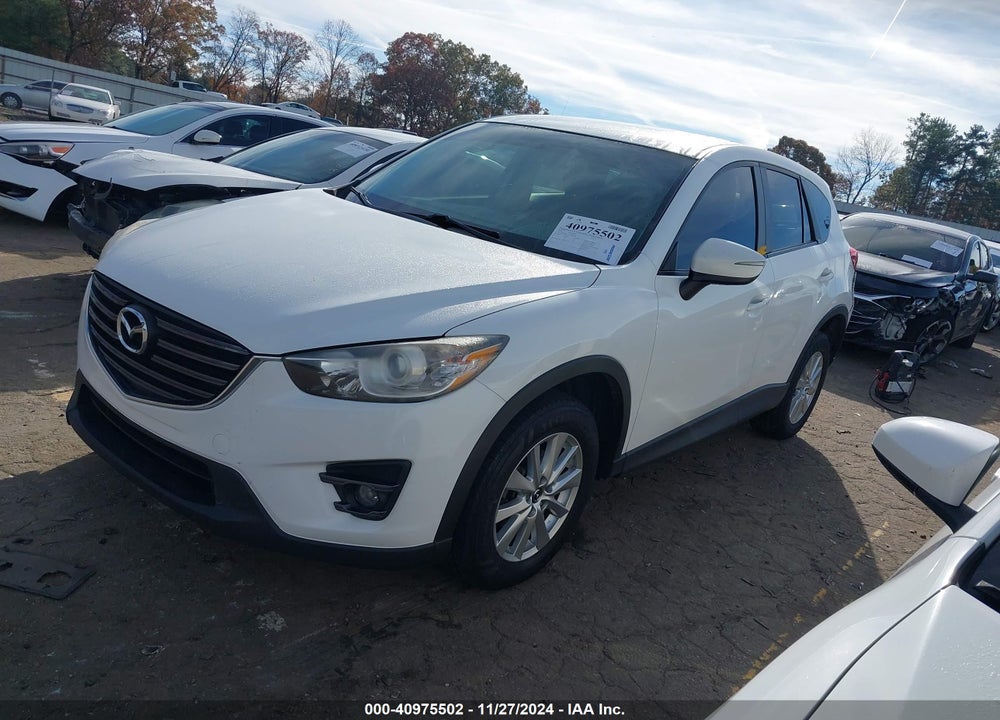 2016 MAZDA CX-5 TOURING VIN: JM3KE4CY6G0668020