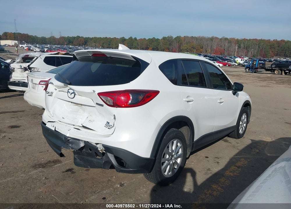 2016 MAZDA CX-5 TOURING VIN: JM3KE4CY6G0668020