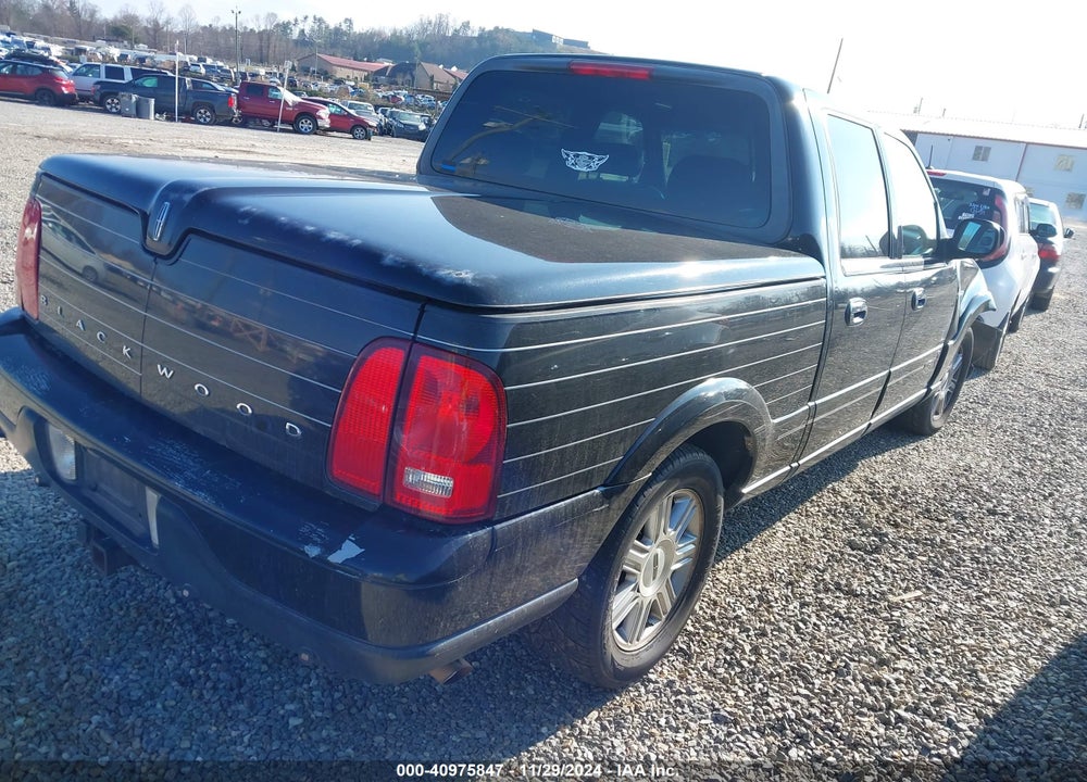 2002 LINCOLN BLACKWOOD VIN: 5LTEW05A52KJ01464