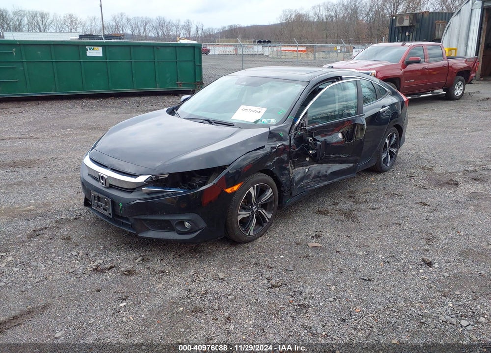 2017 HONDA CIVIC TOURING VIN: 2HGFC1F99HH653044