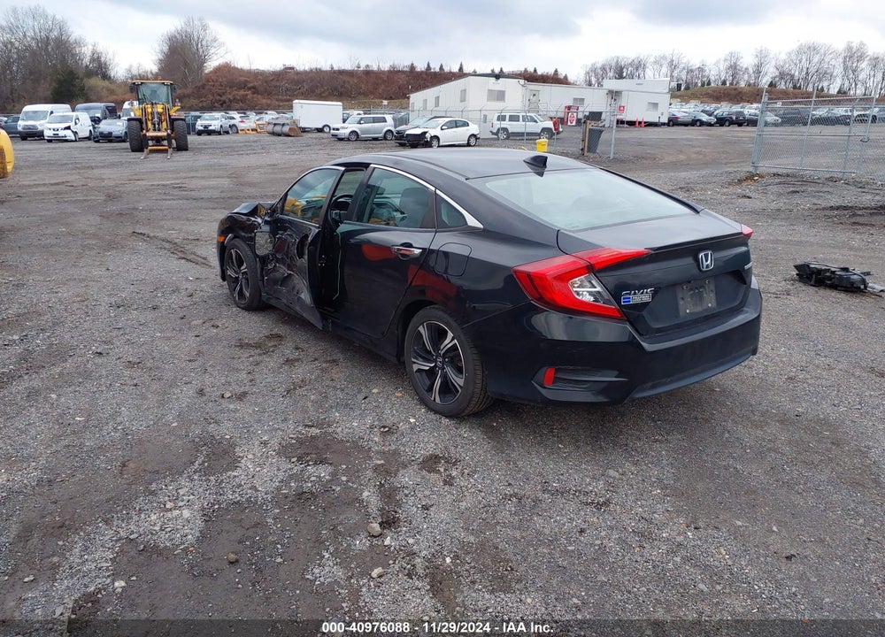 2017 HONDA CIVIC TOURING VIN: 2HGFC1F99HH653044