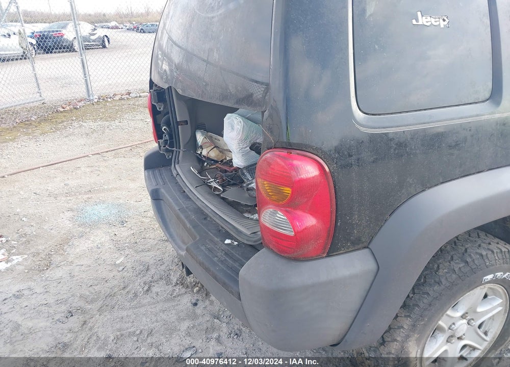2003 JEEP LIBERTY SPORT VIN: 1J4GL48K73W697682