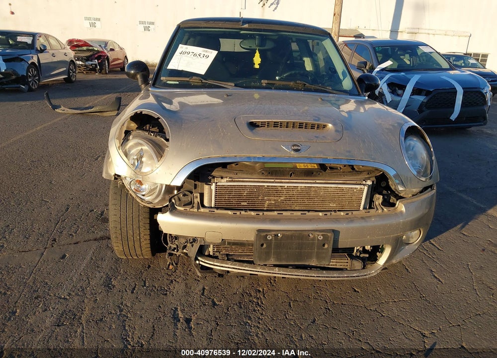 2007 MINI COOPER S VIN: WMWMF73547TT85102