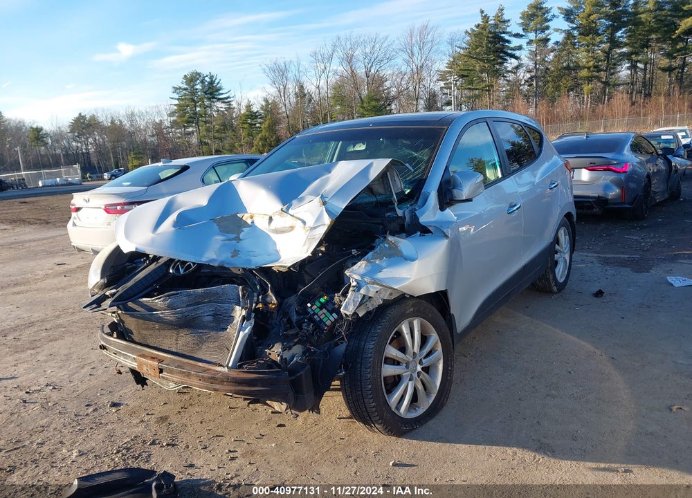 2013 HYUNDAI TUCSON LIMITED VIN: KM8JUCAC8DU623444