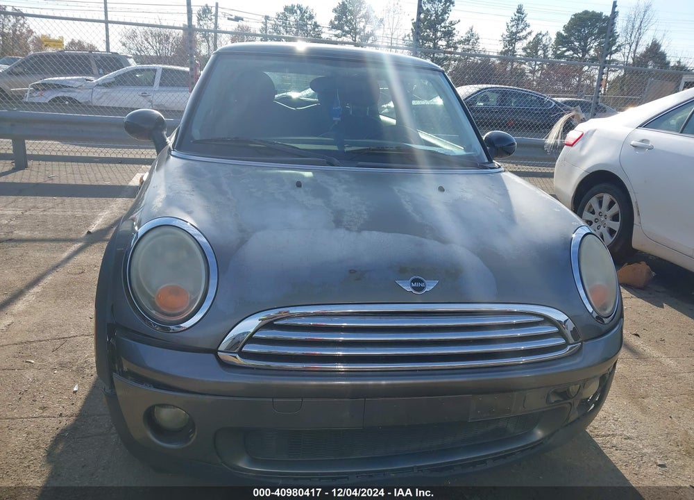 2010 MINI COOPER VIN: WMWMF3C52ATZ24221