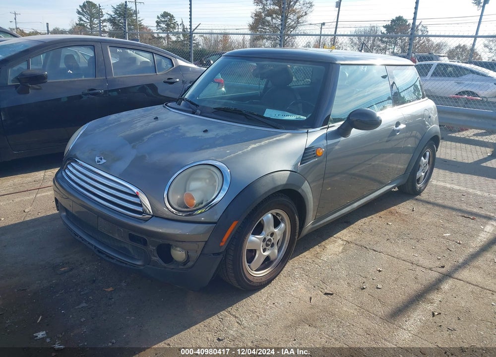 2010 MINI COOPER VIN: WMWMF3C52ATZ24221