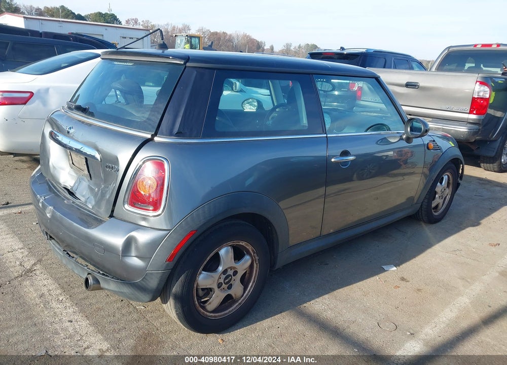 2010 MINI COOPER VIN: WMWMF3C52ATZ24221