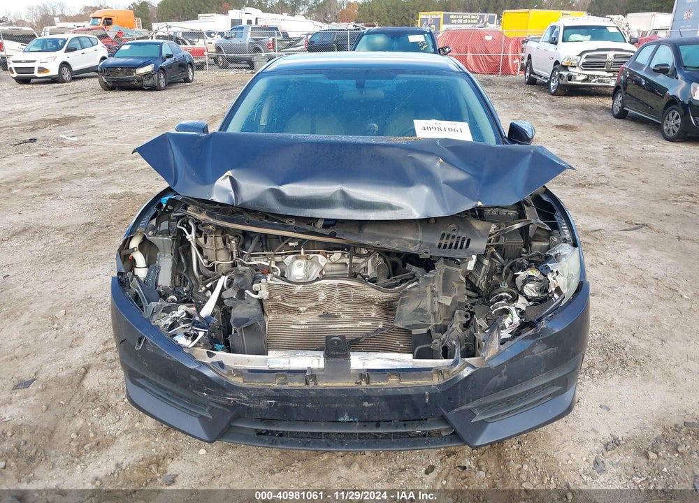 2016 HONDA CIVIC LX VIN: 19XFC2F52GE032028