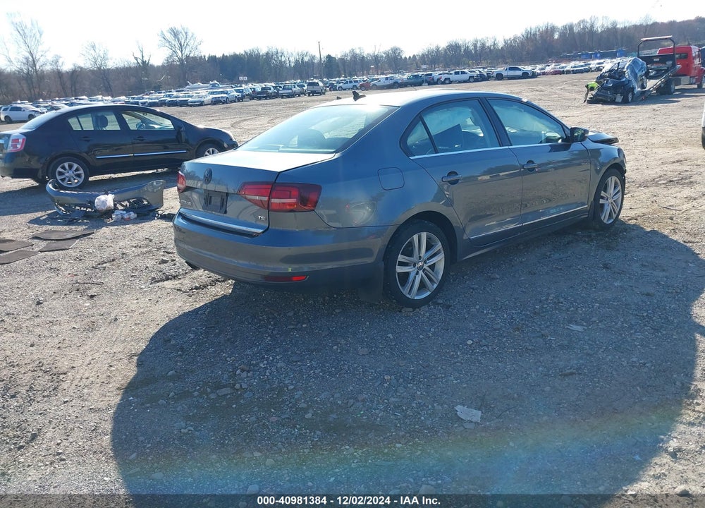 2017 VOLKSWAGEN JETTA VIN: 3VWL17AJ9HM202674