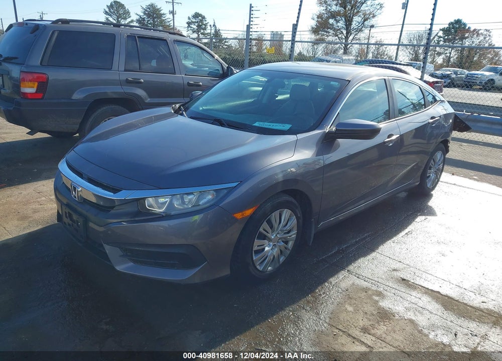 2018 HONDA CIVIC LX VIN: 2HGFC2F58JH520509