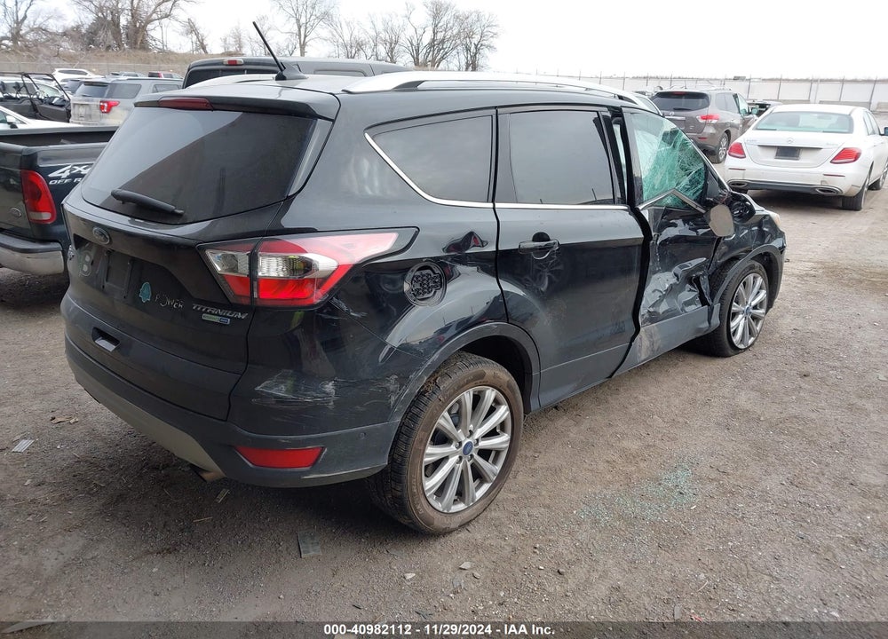 2018 FORD ESCAPE TITANIUM VIN: 1FMCU9J98JUA28380