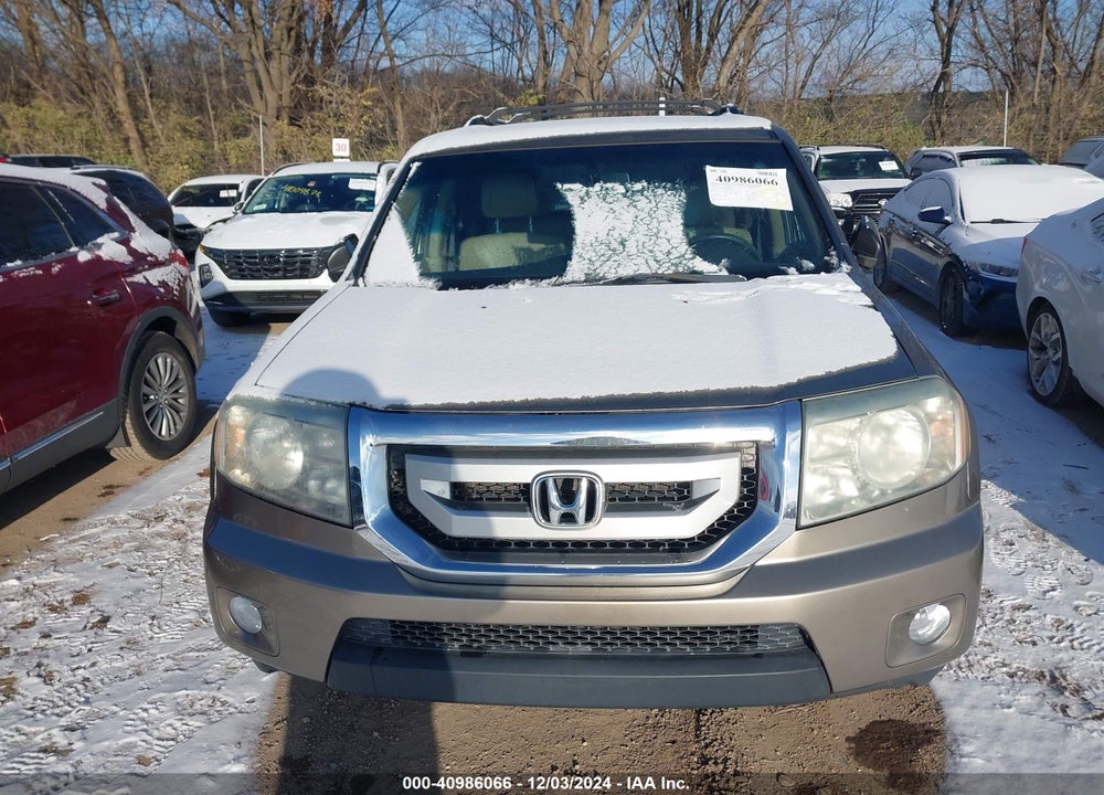 2011 HONDA PILOT EX-L VIN: 5FNYF4H57BB050990