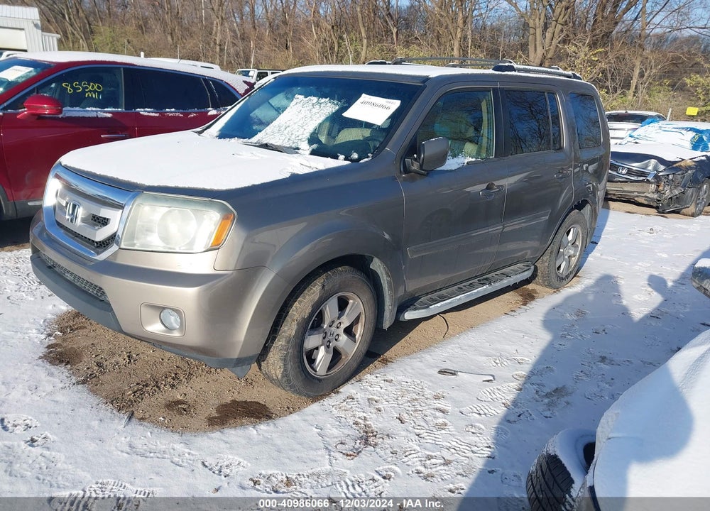 2011 HONDA PILOT EX-L VIN: 5FNYF4H57BB050990