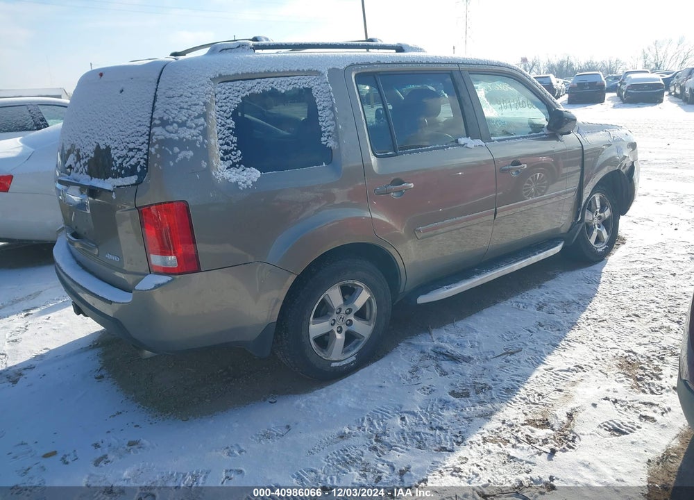 2011 HONDA PILOT EX-L VIN: 5FNYF4H57BB050990
