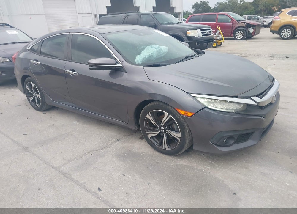 2017 HONDA CIVIC TOURING VIN: 2HGFC1F97HH650434