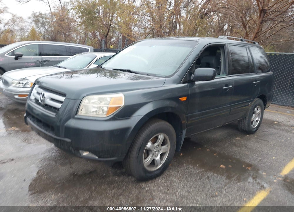 2006 HONDA PILOT EX-L VIN: 5FNYF28566B012290