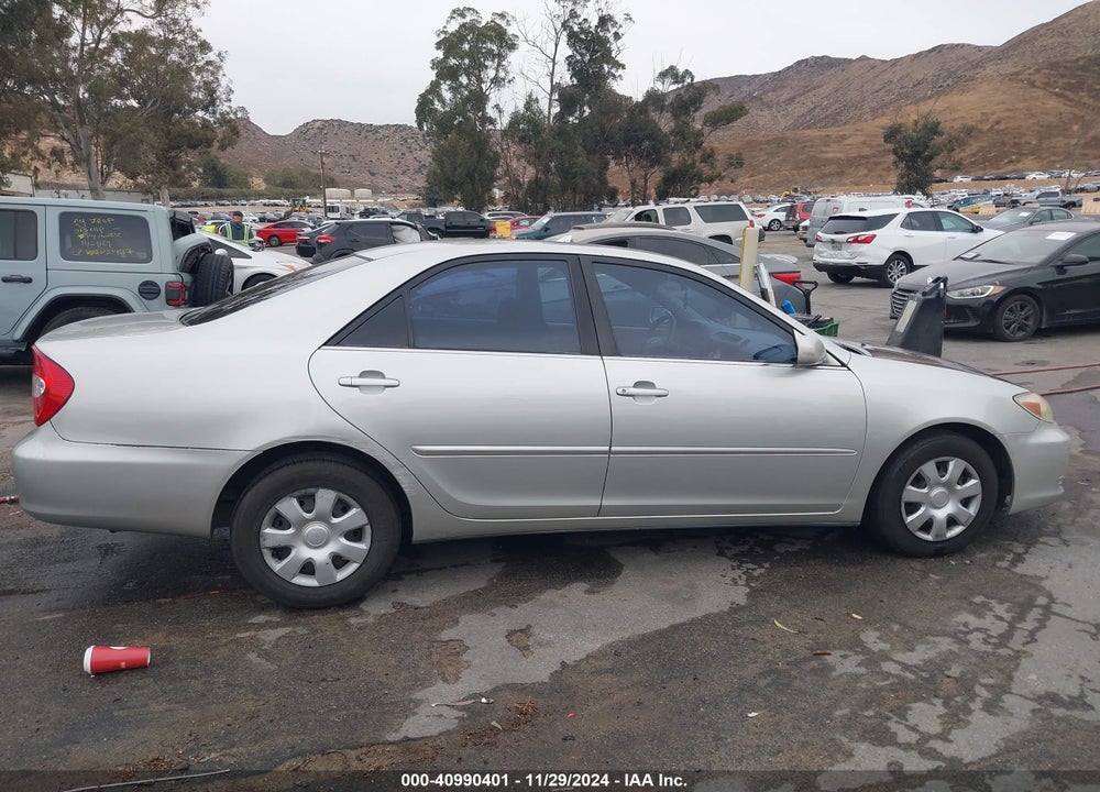 2002 TOYOTA CAMRY LE VIN: JTDBE32K720034675