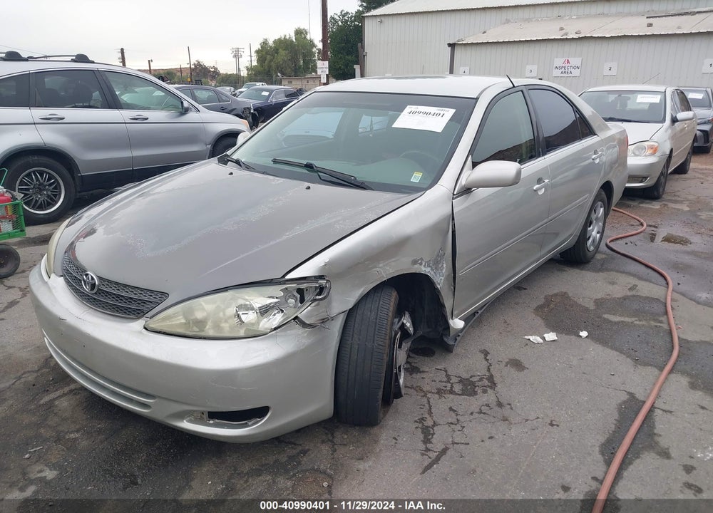 2002 TOYOTA CAMRY LE VIN: JTDBE32K720034675