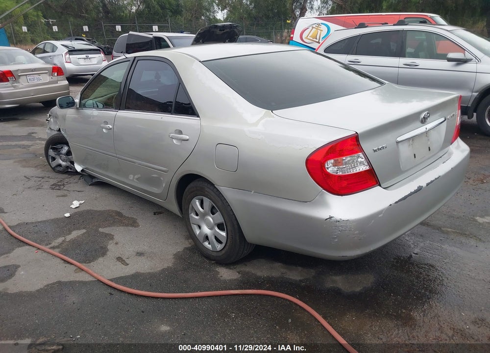 2002 TOYOTA CAMRY LE VIN: JTDBE32K720034675