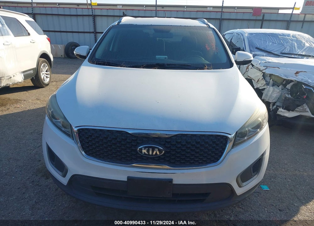 2016 KIA SORENTO 3.3L LX VIN: 5XYPG4A55GG111580