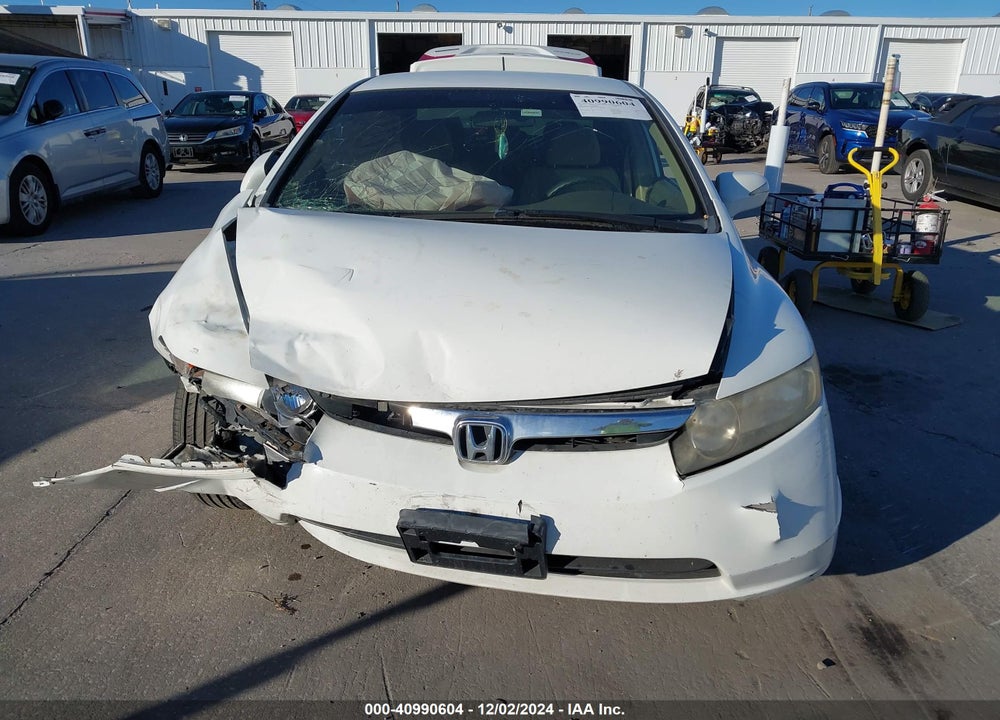 2007 HONDA CIVIC HYBRID VIN: JHMFA36237S028017
