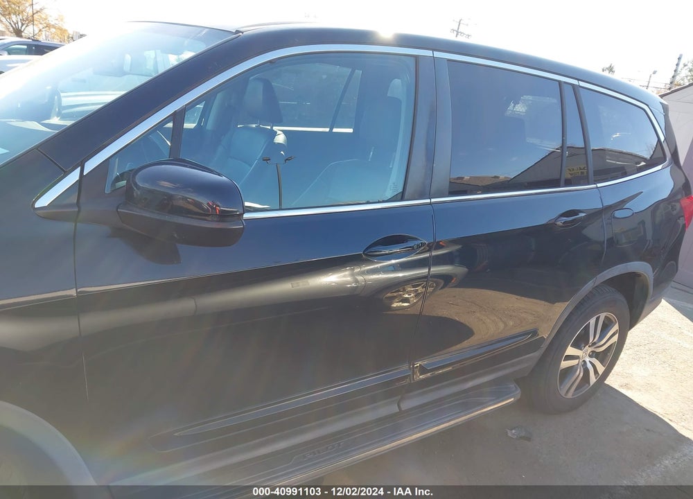 2016 HONDA PILOT EX-L VIN: 5FNYF6H76GB024031