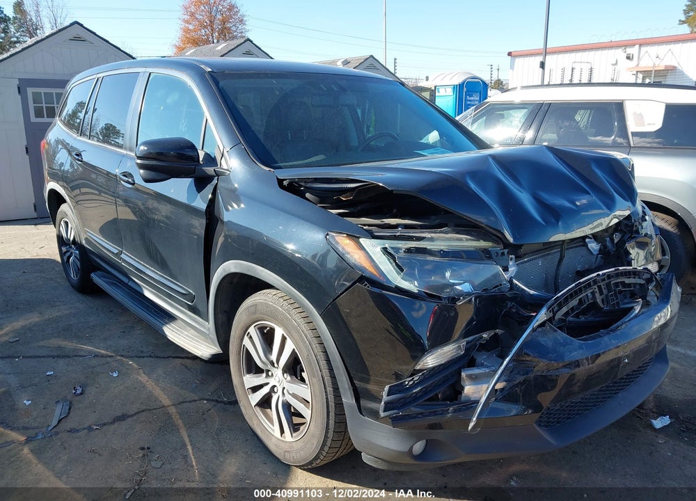 2016 HONDA PILOT EX-L VIN: 5FNYF6H76GB024031