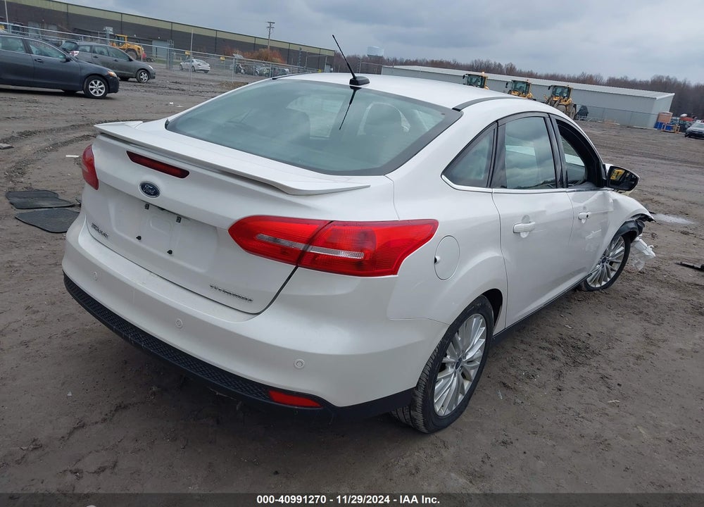 2017 FORD FOCUS TITANIUM VIN: 1FADP3J29HL243479