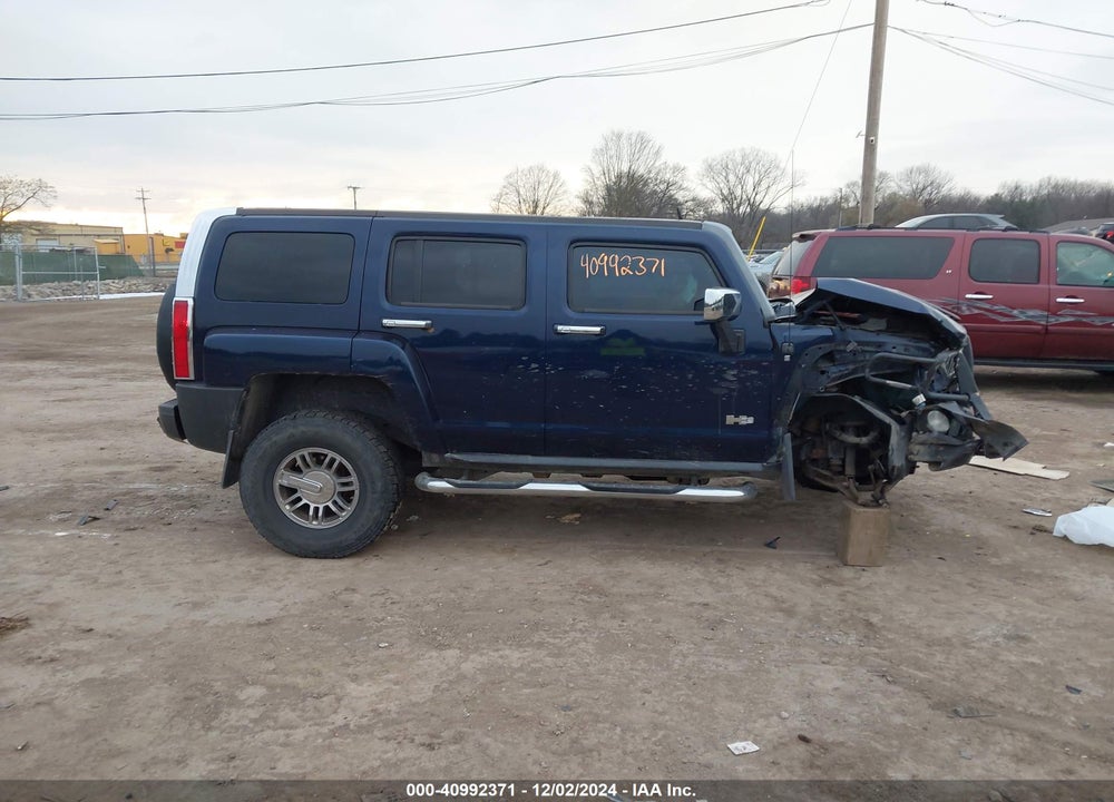 2007 HUMMER H3 SUV VIN: 5GTDN13E678126612