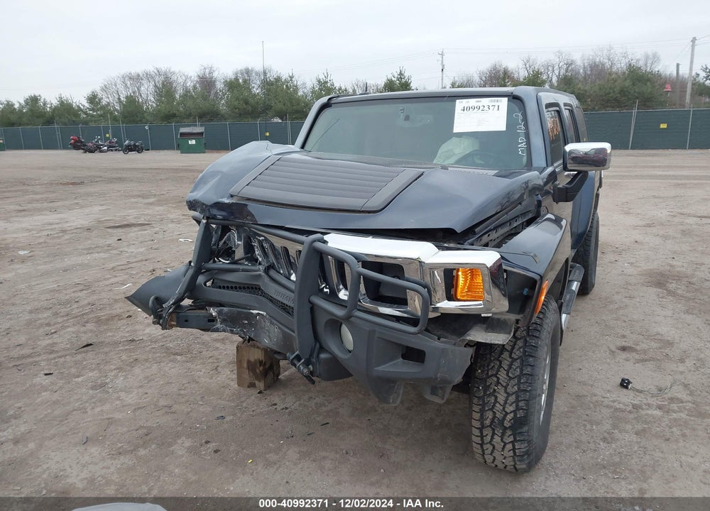 2007 HUMMER H3 SUV VIN: 5GTDN13E678126612