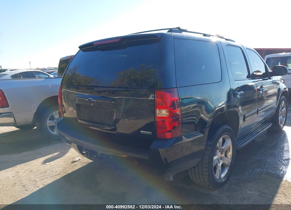 2011 CHEVROLET TAHOE LT VIN: 1GNSCBE0XBR105140