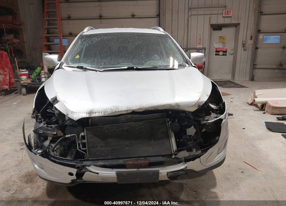 2014 HYUNDAI TUCSON SE VIN: KM8JUCAG2EU800042