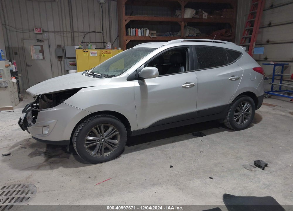 2014 HYUNDAI TUCSON SE VIN: KM8JUCAG2EU800042