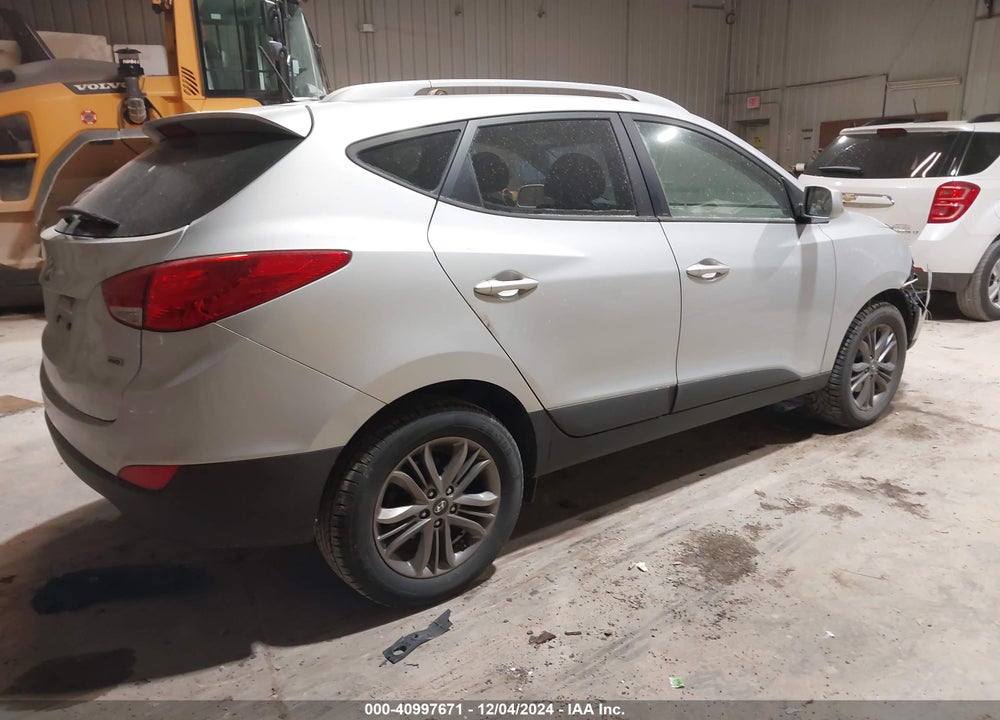 2014 HYUNDAI TUCSON SE VIN: KM8JUCAG2EU800042