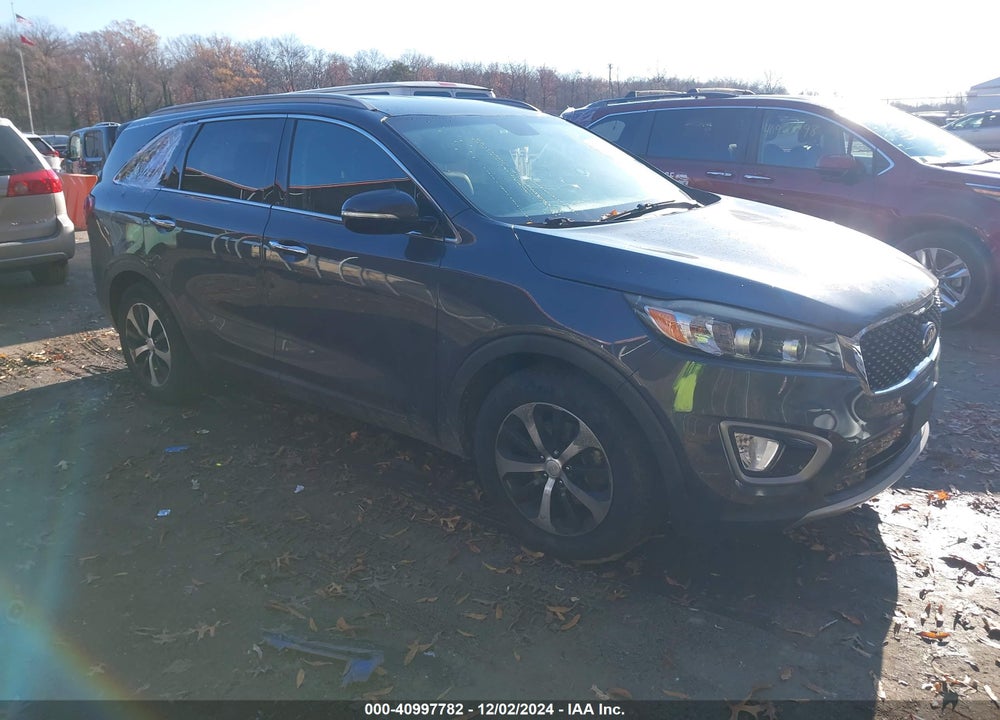2016 KIA SORENTO 3.3L EX VIN: 5XYPH4A54GG044323