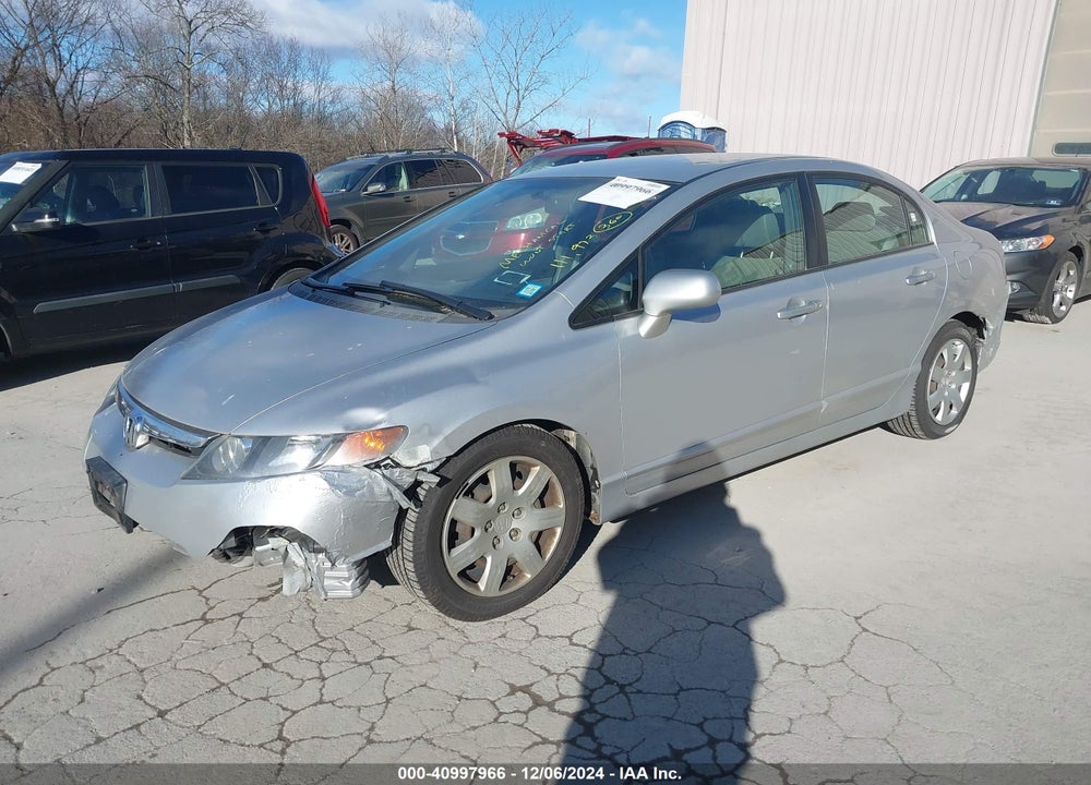 2006 HONDA CIVIC LX VIN: 1HGFA16556L133460