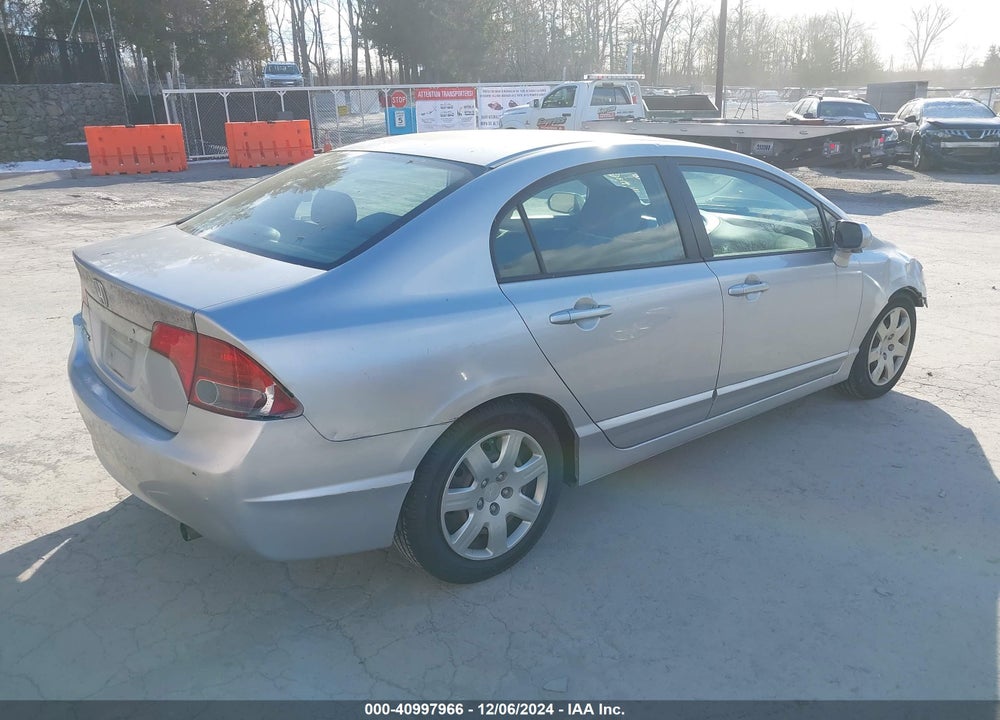 2006 HONDA CIVIC LX VIN: 1HGFA16556L133460