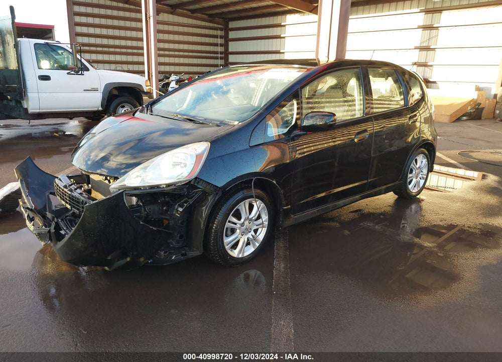 2009 HONDA FIT SPORT VIN: JHMGE87409S032065