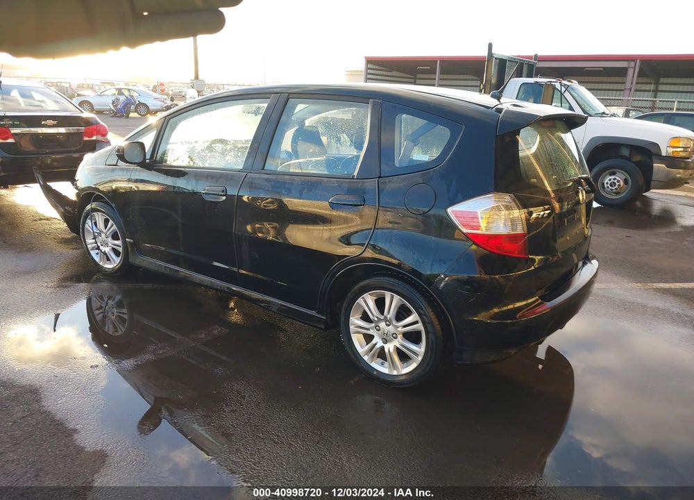 2009 HONDA FIT SPORT VIN: JHMGE87409S032065