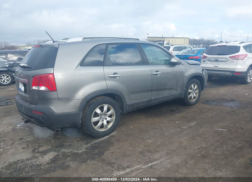 2012 KIA SORENTO LX VIN: 5XYKT3A63CG286588