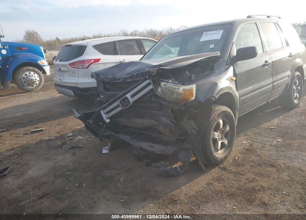 2006 HONDA PILOT EX-L VIN: 2HKYF18676H529974