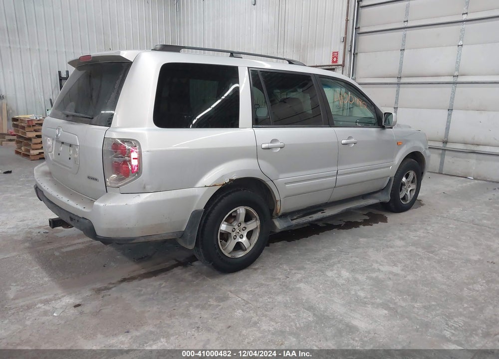 2007 HONDA PILOT EX-L VIN: 5FNYF18557B005696