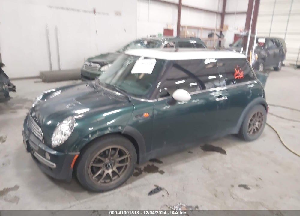 2002 MINI COOPER VIN: WMWRC33472TC33910