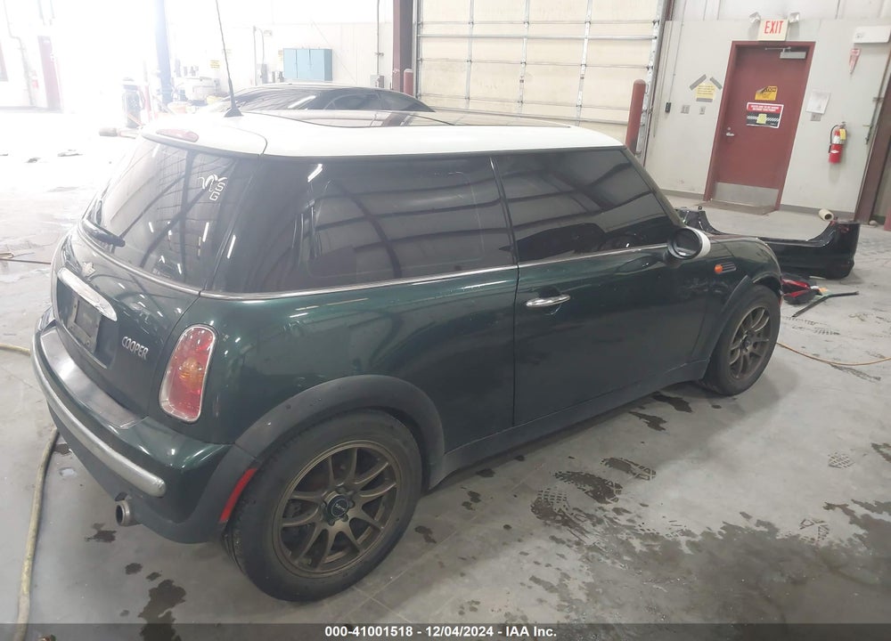 2002 MINI COOPER VIN: WMWRC33472TC33910