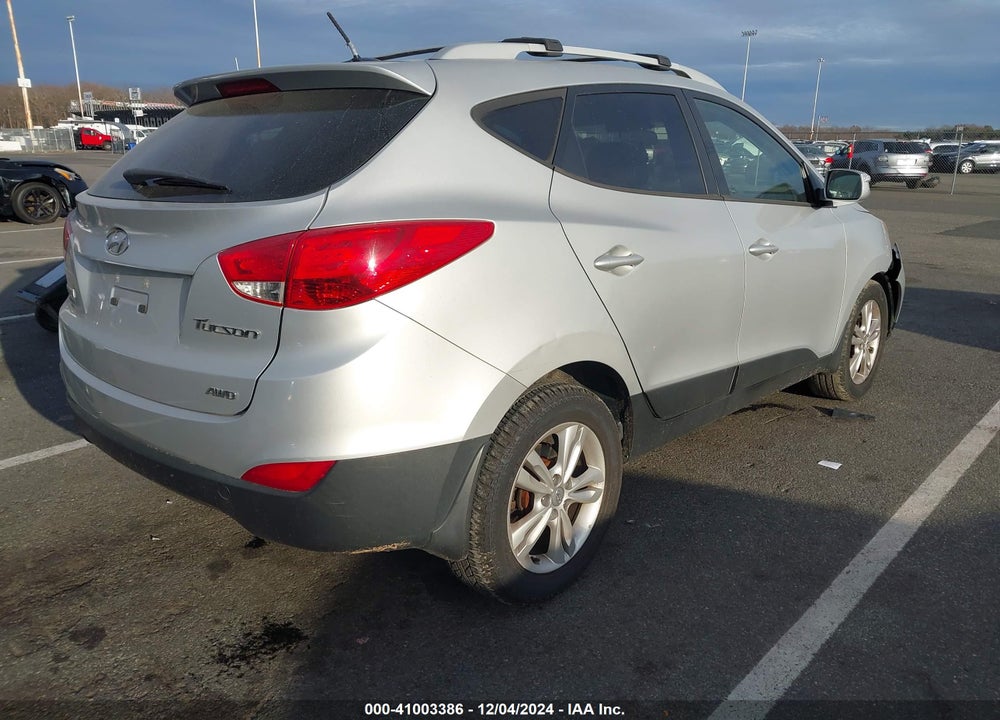 2012 HYUNDAI TUCSON GLS VIN: KM8JUCAC2CU394645